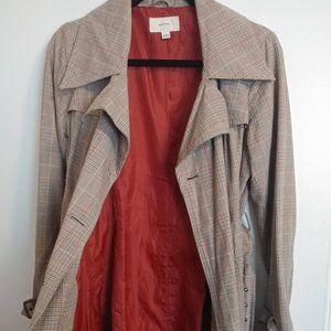 Stylish Merona trench with orange lining.